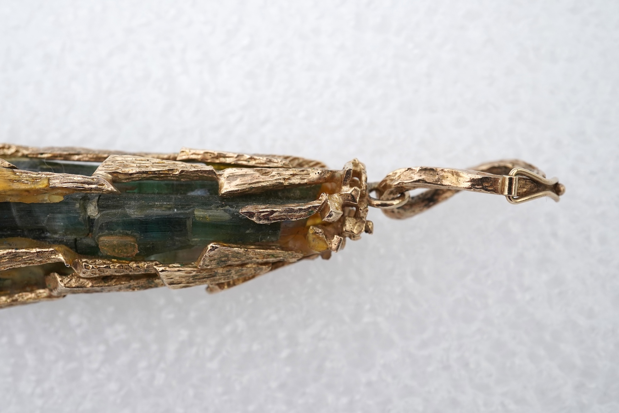 A gold and tourmaline crystal pendant, 1970s